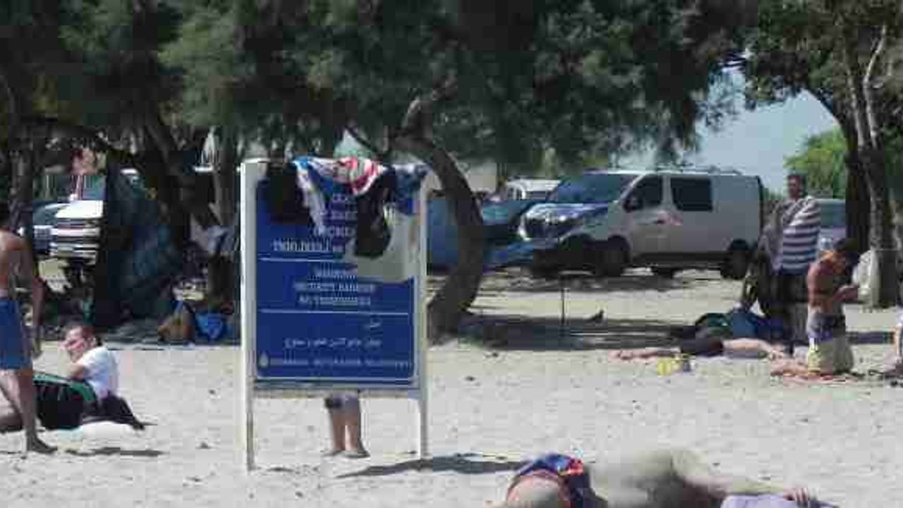 Hafta içi olmasına rağmen Menekşe Plajı doldu taştı